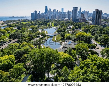 High resolution beautiful panoramic aerial drone image of Lincoln Zoo Chicago and Chicago's skyline and its surroundings