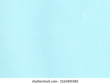 High Resolution Close Up Large Image Of Light, Sky, Baby Blue Uncoated Paper Texture Background With Fine Grain Fiber And Dust Particles Smooth Matt Wallpaper With Copy Space For Text