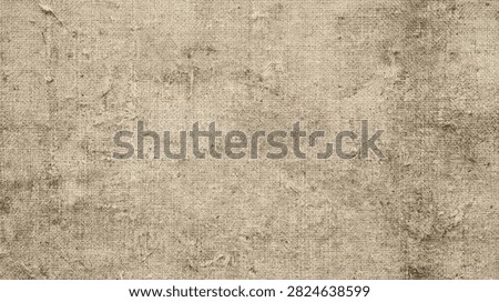 High resolution close up of an old aged beige canvas fabric texture with a distressed vintage surface and organic woven details.