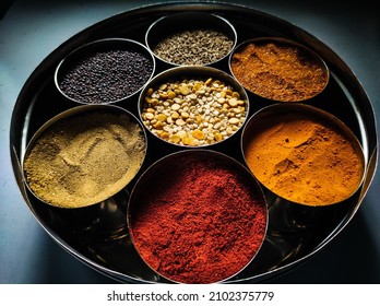 High Resolution INDIAN Spice Box Having Vivid Colored Spices Common In Every Kitchen.