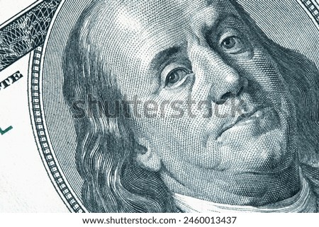 High resolution macro image of Benjamin Franklin on the one hundred US Dollar bill. Close up.