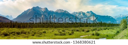 A high resolution panoramic of the Canadian Rockies in Jasper National Park of Alberta.