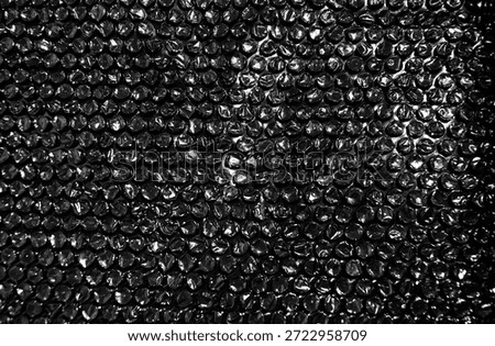 High Resolution Plastic Bubble Wrap Texture. black plastic buble wrap background