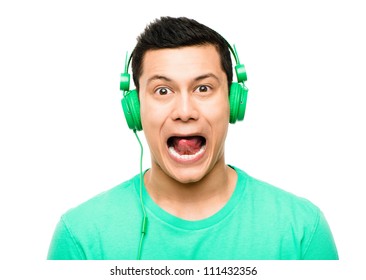 High Resolution Portrait Crazy Asian Man Pulling Funny Faces Wearing Headphones Isolated On Clean White Background