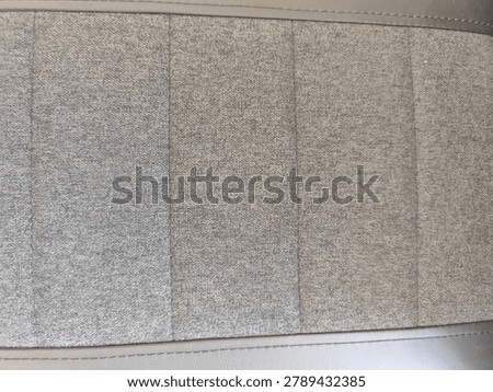 High Resolution Seamless PBR Texture of Fluted Gray Melange Fabric with Leather Trim, Vertical Ribbed Tweed Upholstery Pattern, Albedo Map for Automotive Trim and Commercial Archviz Asset Design
