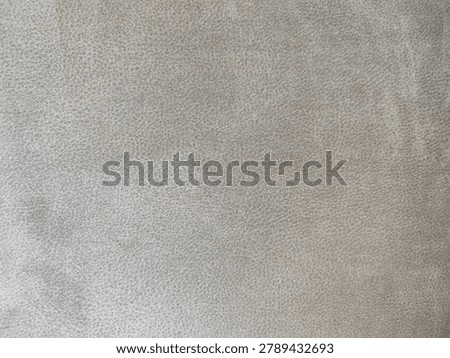 High Resolution Seamless PBR Texture of Greige Distressed Nubuck Leather, Vintage Warm Gray Faux Suede Hide Albedo Map for Interior Archviz and Premium Furniture 3D Asset Design
