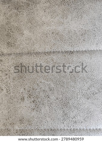 High Resolution Seamless PBR Texture of Crackled Greige Leather, Distressed Vintage Taupe Hide Surface with Horizontal Stitched Seam, Albedo Map for Interior Archviz and Premium Furniture 3D Asset Design
