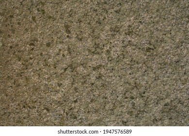 A high resolution shot of some weathered brown marble.