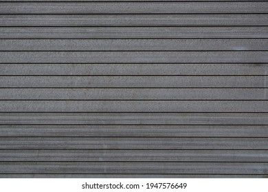 A high resolution shot of a steel rolling shutter.