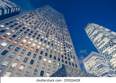 The High Rise Building In Downtown At Night