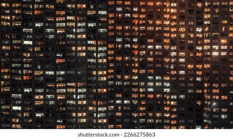 High Rise Building Window Front at Night. - Powered by Shutterstock