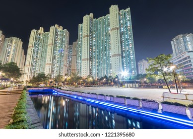 High Rise Residential Building And Public Park In Hong Kong City At Night