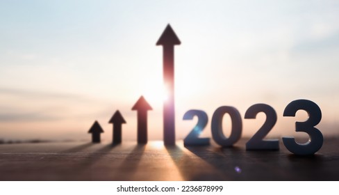 High rising arrow and bright rising sun 2023 new year sunrise and stock finance economy industry growth investment target concept
 - Shutterstock ID 2236878999
