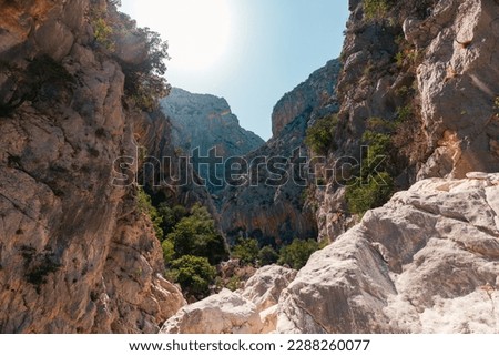 High rocky walls of Gorropu Canyon, Sardinia, Italy