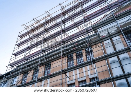 High scaffold for temporary roof being erected around a building, to allow building works and a re-roof to be carried out Photo stock © 