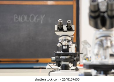 High School Biology Lab. Focus On Microscope