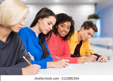 High School Or College Students Studying