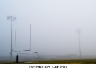 High School Football Field On A Foggy Morning Day