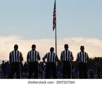 High School Football Officials Stand Together For The National Anthem