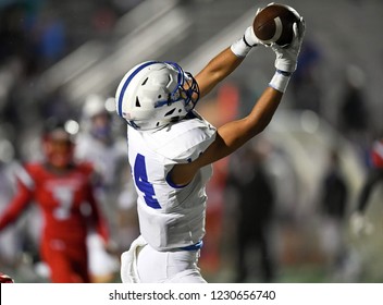 High School Football player in action during a game in South Texas