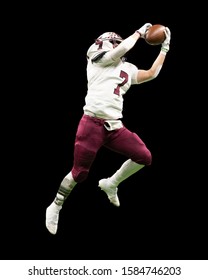 High School Football Players In Action During A Game In South Texas