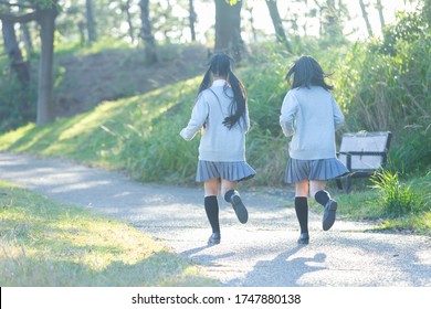 High school girl running in the park