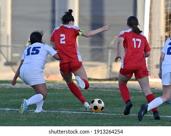 High School Girls Competing In A Soccer Match In South Texas