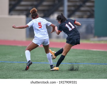 High School Girls Competing In A Soccer Match In South Texas