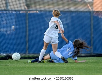 High School Girls Competing In A Soccer Match In South Texas