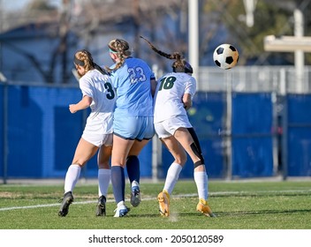 High School Girls Competing In A Soccer Match In South Texas