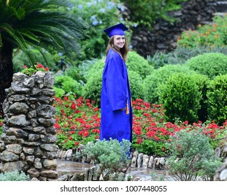 High School Senior In Graduation Photos At Beautiful Botanical Garden