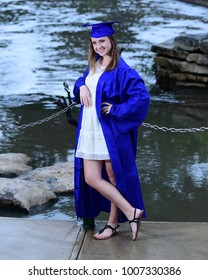 High School Senior Posing For Senior Pictures At A Local Water Park