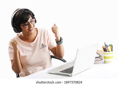 High School Student Winning An Educational Quiz Or Learnign From Her Laptop