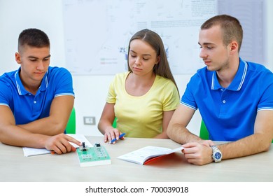 High school students learning physics 