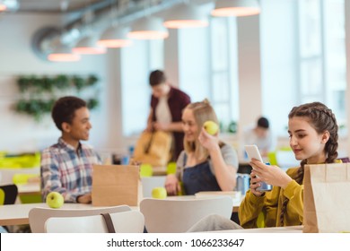 High School Students Spending Time At School Cafeteria During Lunch