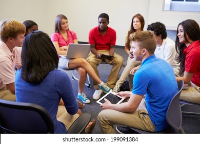 High School Students Taking Part In Group Discussion