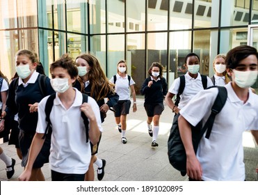 High School Students Wearing Masks On Their Way Home