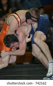 High School Wrestlers Competing. Editorial Use Only.