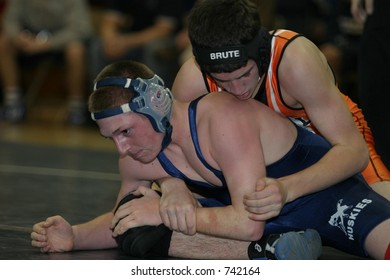 High School Wrestlers Competing. Editorial Use Only.