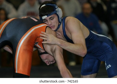 High School Wrestlers Competing. Editorial Use Only.