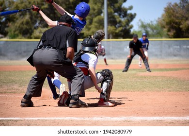 High School Youth Baseball Batter Swing And Miss Strike