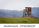 High seat for hunters and gamekeepers in the nature. Nature of Czech republic.