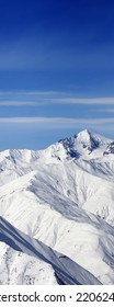 High snowy mountains and blue sky with clouds at sunny winter day. Caucasus Mountains, Georgia region Gudauri. - Shutterstock ID 2206243037