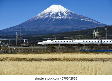 High Speed Bullet Train Tokaido Shinkansen and Fuji mountain with rice field, Fuji, Shizuoka, Japan