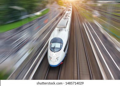 High Speed Fast Train Passenger Locomotive Railroad Travel Motion Blur Effect In The City, Top Aerial View Above