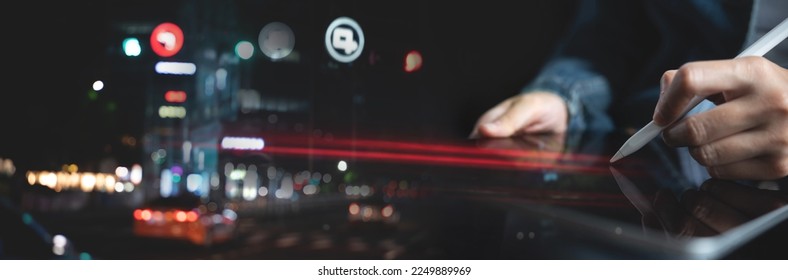 High speed internet technology, IoT Internet of Things concept. People using digital tablet, double exposure with blurred city traffic light, communication network, technology background - Shutterstock ID 2249889969