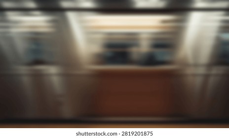 High speed motion blur effect showing a transit train passing through a station interior with abstract light streaks.