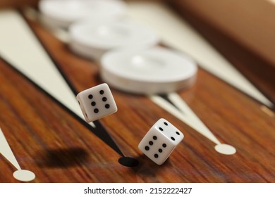high speed photography of dice rolling in backgammon