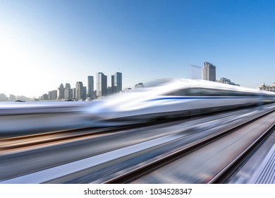 High Speed Railway With Cityscape And Modern Office Building In Urban