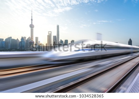 high speed railway with cityscape and modern office building in urban